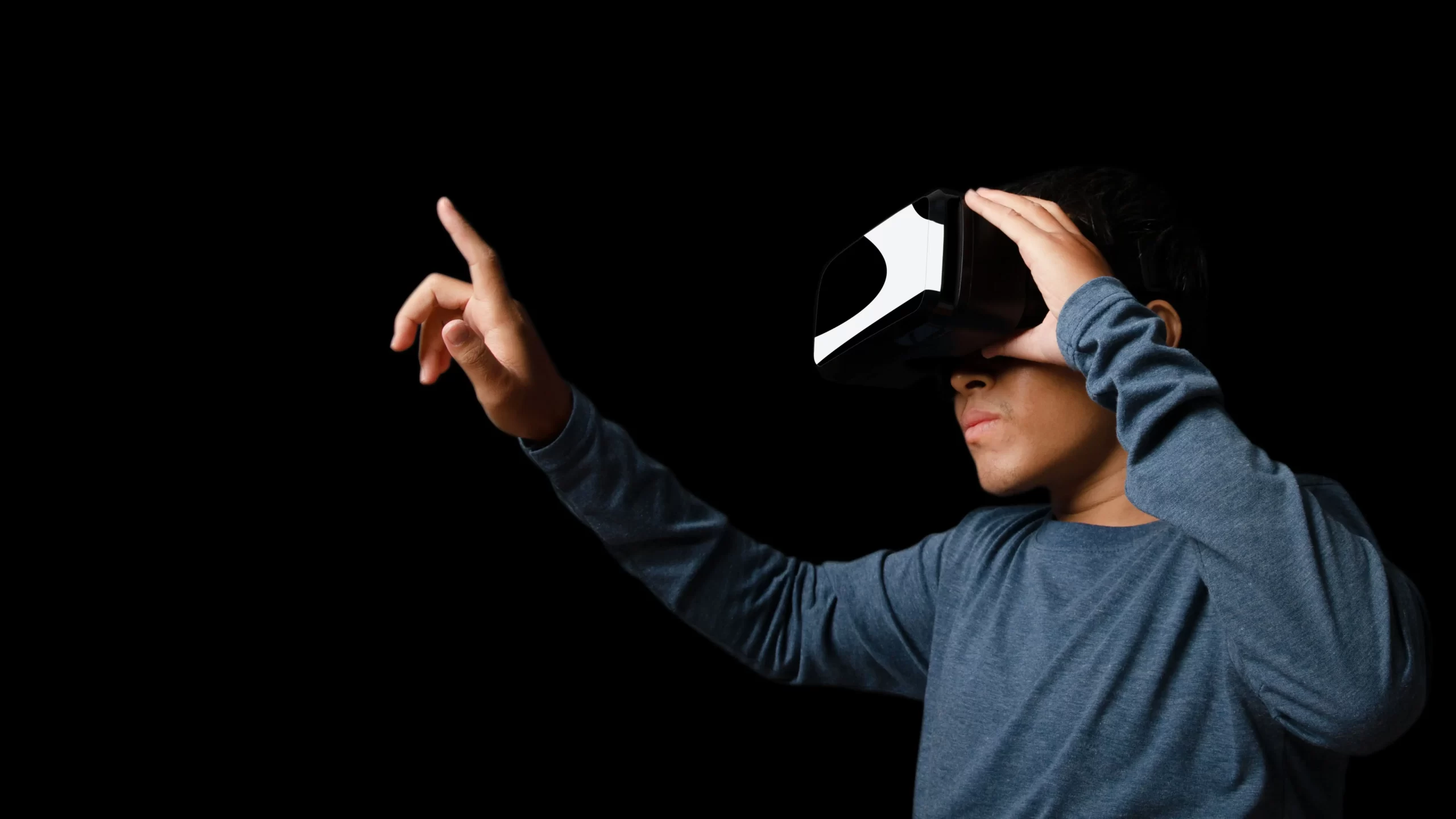 young-man-using-virtual-reality-headset-vr-future-technology-online-concept-dark-background-_2_